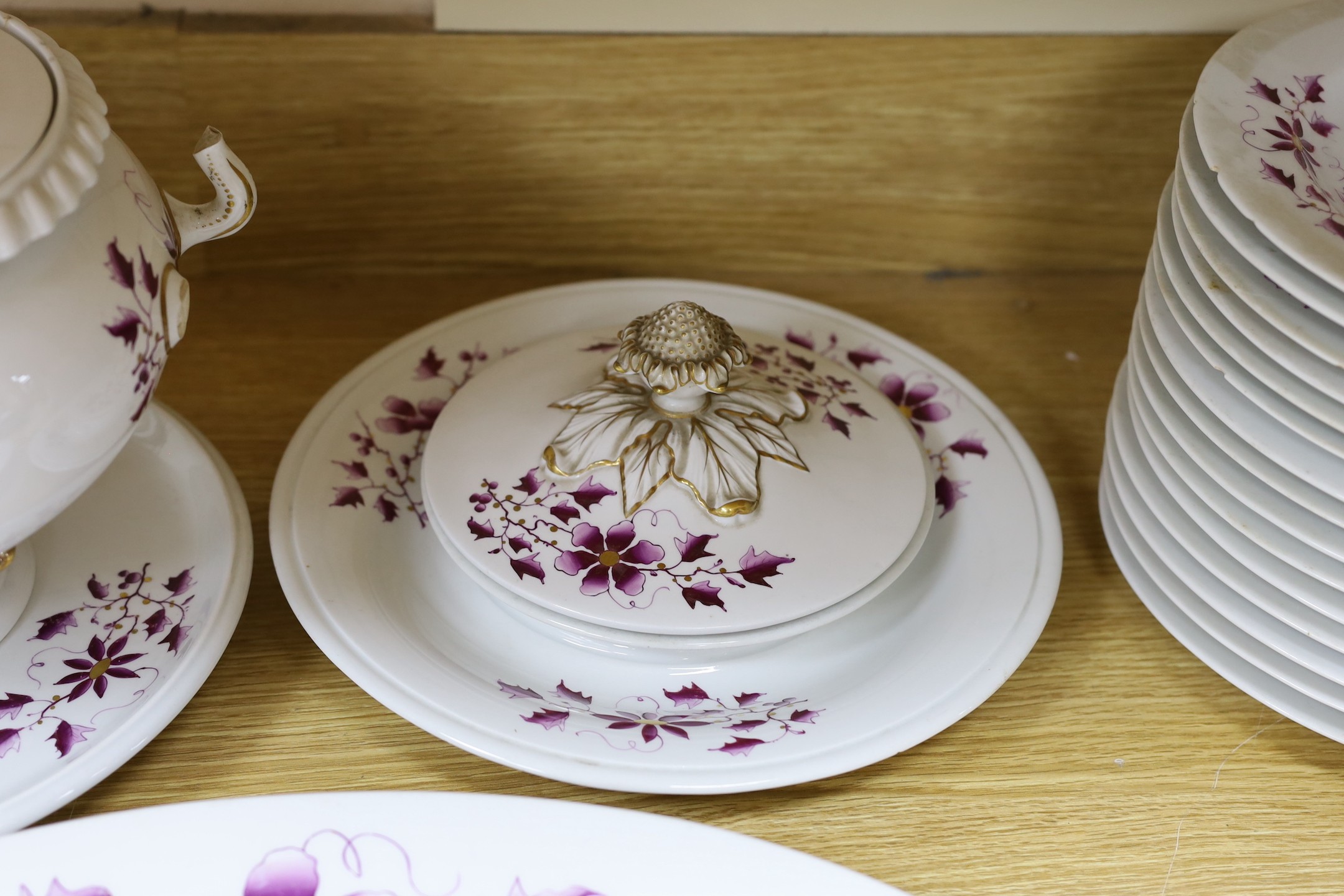 A Flight Barr and Barr floral and gilt decorated part dinner service